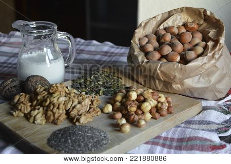 Roasted organic homegrown nut food on a wooden surface.