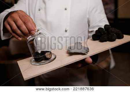 restaurant chef delicacy. truffle vegan food mushroom waiter service meal concept