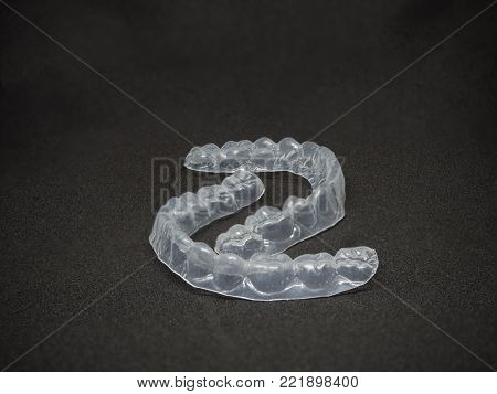 Plastic transparent dental retainer or clear retainer