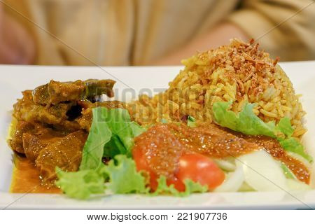 Close up Beef Biryani with green curry, Thai muslim halal food, Khao Mok