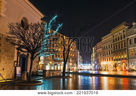 Krakow, Poland January 22, 2017: Night view of Grodzka Street in the Old Town in Krakow, Poland