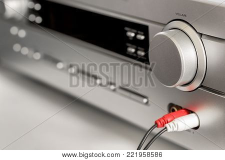 Hifi system amplifier. Home musical equipment closeup. Vintage stereo receiver
