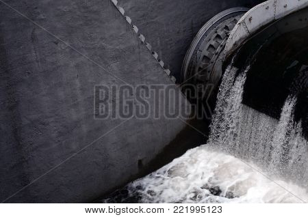 A picture of the flowing water. The dam is designed to regulate the water level in rivers within the city and to provide technical water to industrial objects