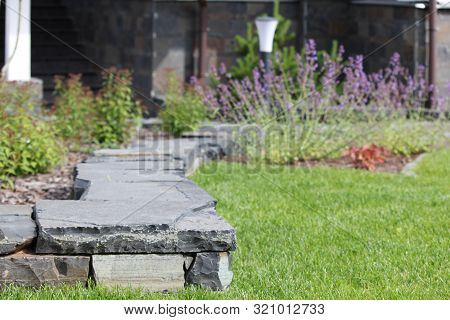Low Retaining Wall Made Of Shungite Plates