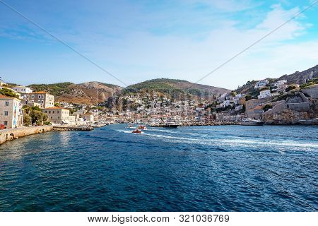 Picturesque View At The Port With Water Taxi Town Of Hydra Island In Greece