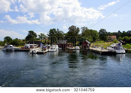 Karlshamn, Blekinge, Sweden - July 26, 2019: Mooring Place On Swedish Island Village Tärnö.