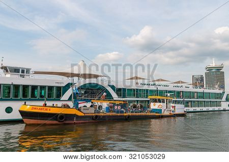 Amsterdam, The Netherlands - August 21 2019: Rhine River Cruise Ship Being Refueled By A Fuel Boat I