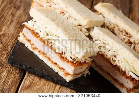 Japanese Style Appetizer Sandwiches Katsu Sando With Tonkatsu Sauce And Cabbage Closeup On A Slate B