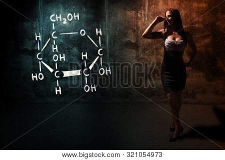 Sexy Girl Or Secretary Or Female Student Presenting Handdrawn Chemical Formula Of Glucose