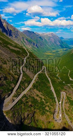 Trolls Path Trollstigen Winding Scenic Mountain Road With Many Cars, Norway Europe. National Tourist