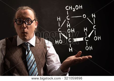 Professor Presenting Handdrawn Chemical Formula Of Glucose