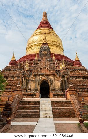 Vertical Picture Of Architectural Dhammayazika Pagoda Located Inside The Archeological Park Of Bagan