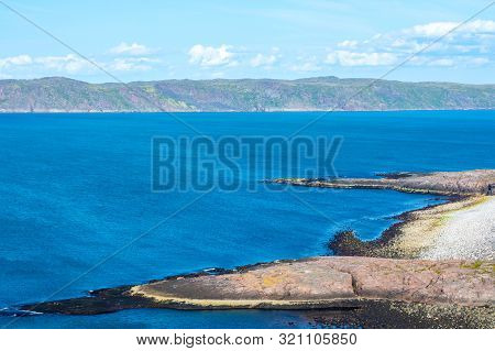 The Shore Of The Barents Sea (the Arctic Ocean), View From The Cliff . Near Teriberka, Murmansk, Rus