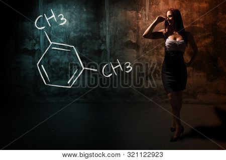 Sexy Girl Or Secretary Or Female Student Presenting Handdrawn Chemical Formula Of M-xylene
