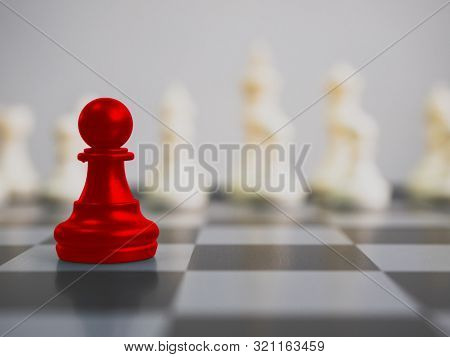 Red Colour Pawn Surrounded By White Chess Pieces On A Chess Board. Strategic Planning Business Compe