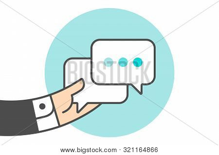 Icon Of Dialog Messages. Two White Boobles Messages With Text. Hand Of Businessman Holds The Message