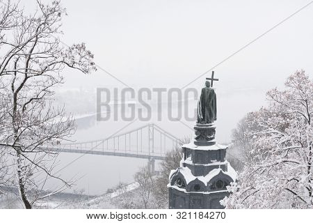 Volodymyr Great Monument. Vladimir Hill Park. View on the Dnipro river, Trukhaniv island. Historic landmark. Winter Kiev (Kyiv), Ukraine