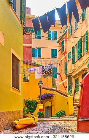 Old street in Boccadasse district in Genoa, Liguria, Italy       