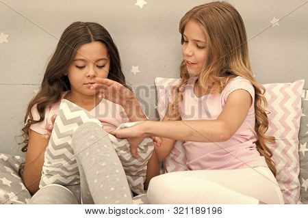 Evening Time For Fun. Girls Happy Best Friends Or Siblings In Cute Stylish Pajamas With Pillows Slee