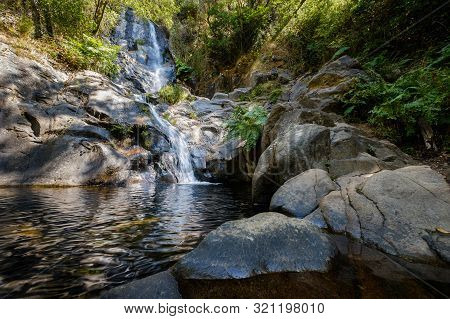 Serra Do Espinhal, Portugal - August 31, 2019 : Waterfall Pedra Ferida, Coimbra, Portugal