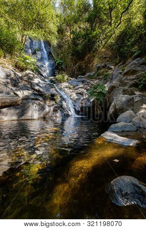 Serra Do Espinhal, Portugal - August 31, 2019 : Waterfall Pedra Ferida, Coimbra, Portugal