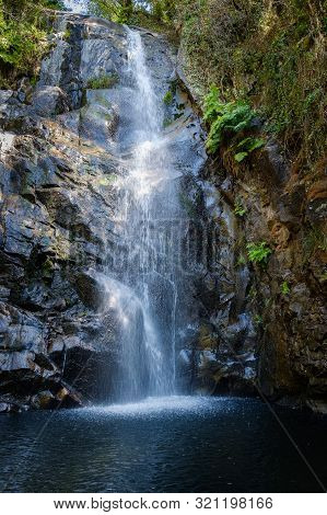 Serra Do Espinhal, Portugal - August 31, 2019 : Waterfall Pedra Ferida, Coimbra, Portugal