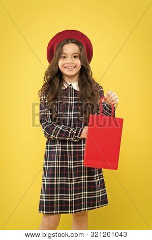 Hurry Last Chance Because Its Sale. Cute Small Child Smiling With Purchase Bought At Sale On Yellow 