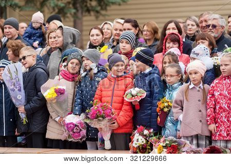 Tyumen, Russia - September 1, 2019: Gymnasium Number 5. School Line Is In Schoolyard With Pupils And
