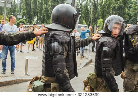 Kiev, Ukraine, 06.23.2019. Police In Protective Helmets And Body Armor Keep Order At The Meeting. Se