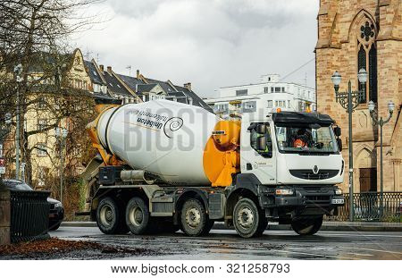 Strasbourg, France - Dec 15, 2017: Renault Truck Carrying Unibeton Italcementi Group Concrete Mixer 