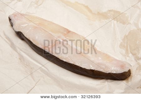 オヒョウのステーキ耐油包装紙を魚します。