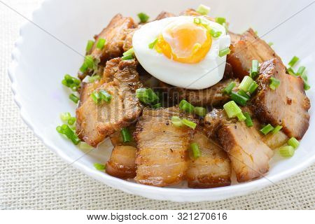Bowl Of Rice Topped With Braised Pork Belly And Boiled Egg, Japanese Called Kakuni-don