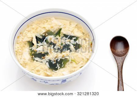 Japanese Foof, Kakitama Egg Soup In A Bowl On White Background　