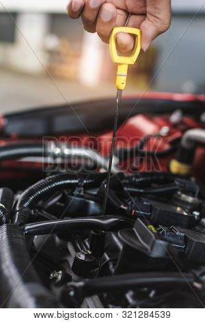 Man Service Mechanic Maintenance Inspection Service Maintenance Car Check Engine Oil Level Car In Ga
