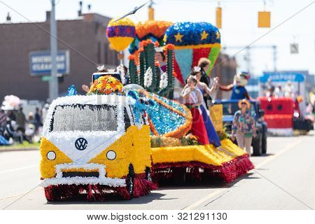 Benton Harbor, Michigan, Usa - May 4, 2019: Blossomtime Festival Grand Floral Parade, Float Carrying