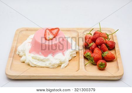 Italian Dessert Pana Cotta With Strawberries And Jam