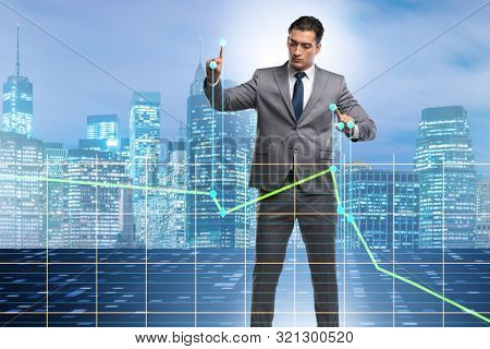Businessman controlling the market with strings