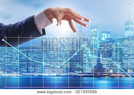 Businessman controlling the market with strings