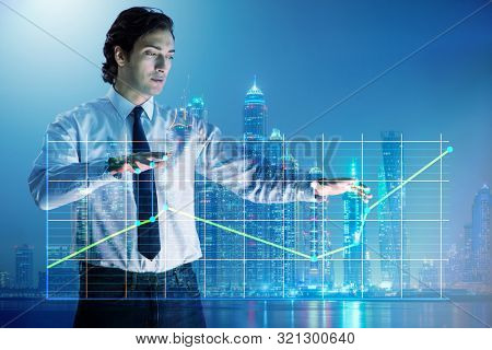 Businessman controlling the market with strings