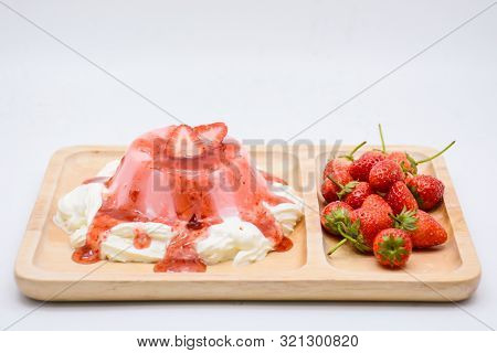 Italian Dessert Pana Cotta With Strawberries And Jam