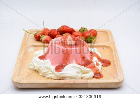 Italian Dessert Pana Cotta With Strawberries And Jam
