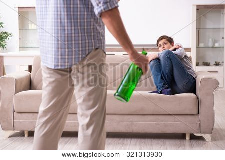 Father beating and punishing his sone