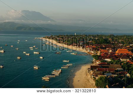 Panoramic View Of The Northern Coast Of The Island Of Lembongan And Jungutbatu Village. Gungung Agun