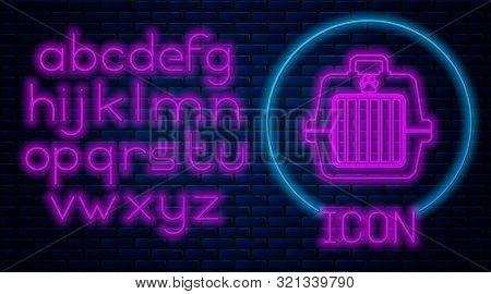 Glowing Neon Pet Carry Case Icon Isolated On Brick Wall Background. Carrier For Animals, Dog And Cat