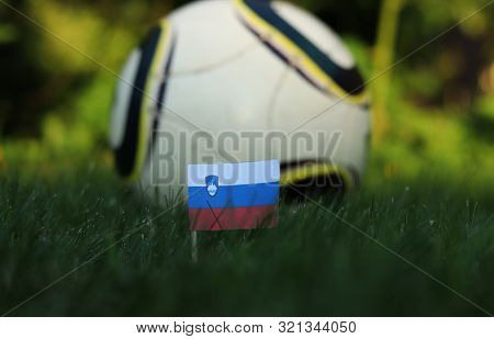 Flag Of Slovenia Stabbed In Playground With White Ball. World Championship 2022. Euro 2020. Slovenia