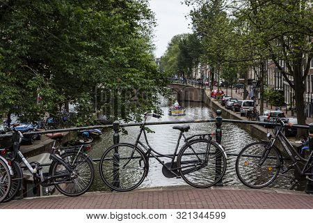 Amsterdam, Holland - July 1, 2017: Amsterdam Is One Of The Most Well Known Bicycle Friendly Cities W