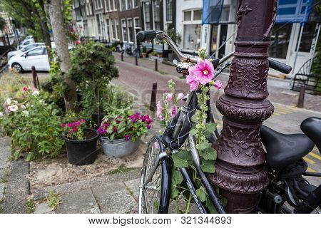 Amsterdam, Holland - July 1, 2017: Amsterdam Is One Of The Most Well Known Bicycle Friendly Cities W