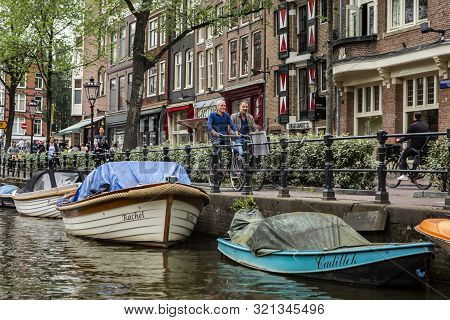 Amsterdam, Holland - July 1, 2017: Amsterdam Is One Of The Most Well Known Bicycle Friendly Cities W