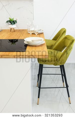 Modern Minimalist Open Kitchen Interior With Wooden Countertop Vitroceramic Cooking Surface Table Se