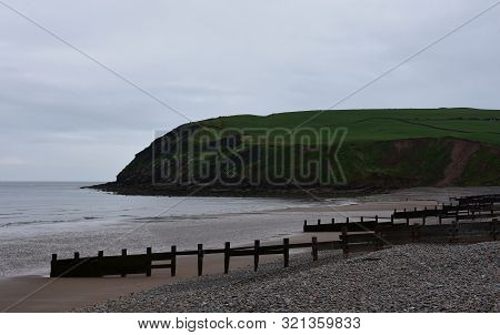Green Sea Cliffs Rising Up Out Of The Irish Sea In St Bees.